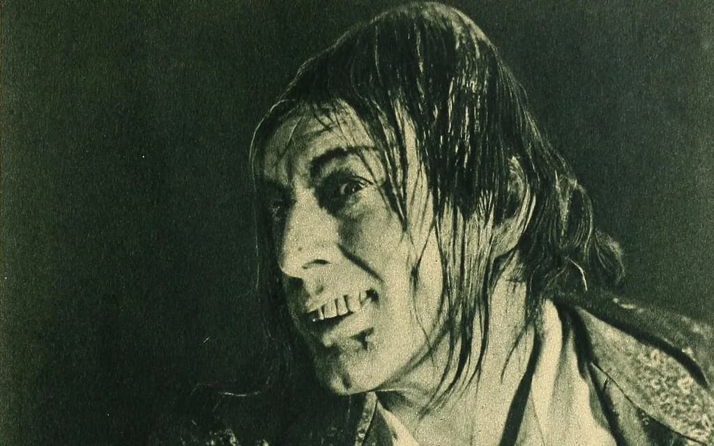 John Barrymore in makeup as Mr Hyde in the 1920 Paramount film, lank hair falling over his face