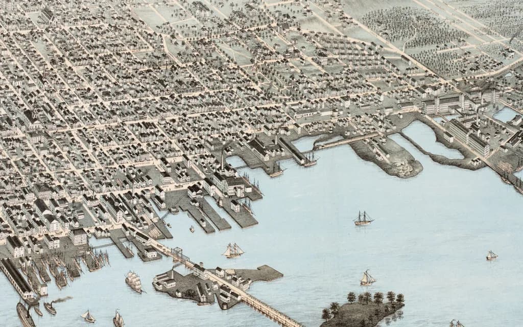 An 1876 bird's-eye lithograph of New Bedford harbour, wharves crowded with whaling ships and boats on the water