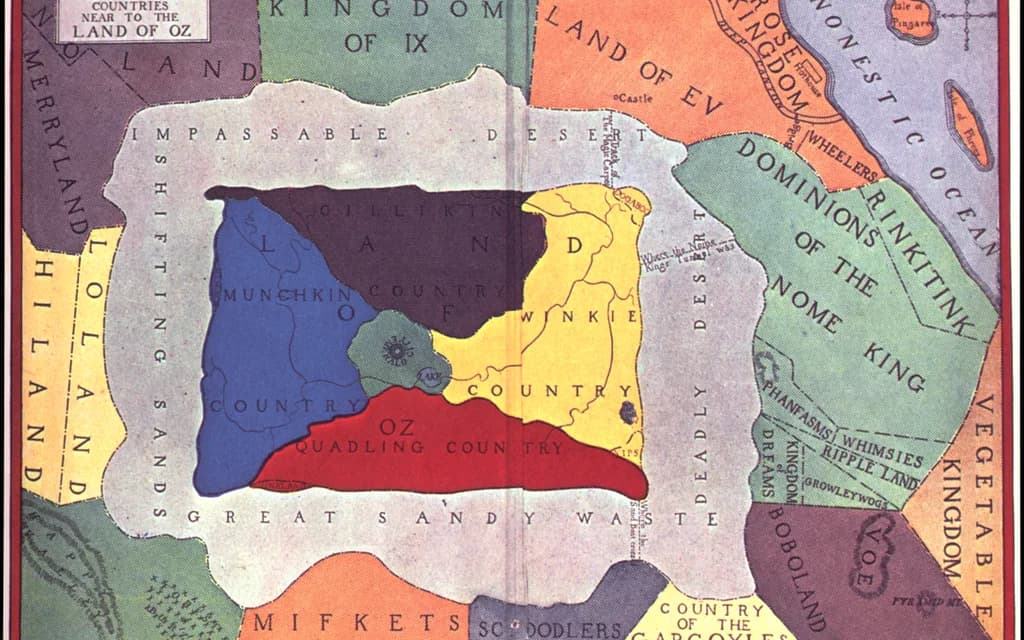 A 1914 colour map of the Land of Oz showing the blue Munchkin Country, yellow Winkie Country, red Quadling Country and purple Gillikin Country around the Emerald City