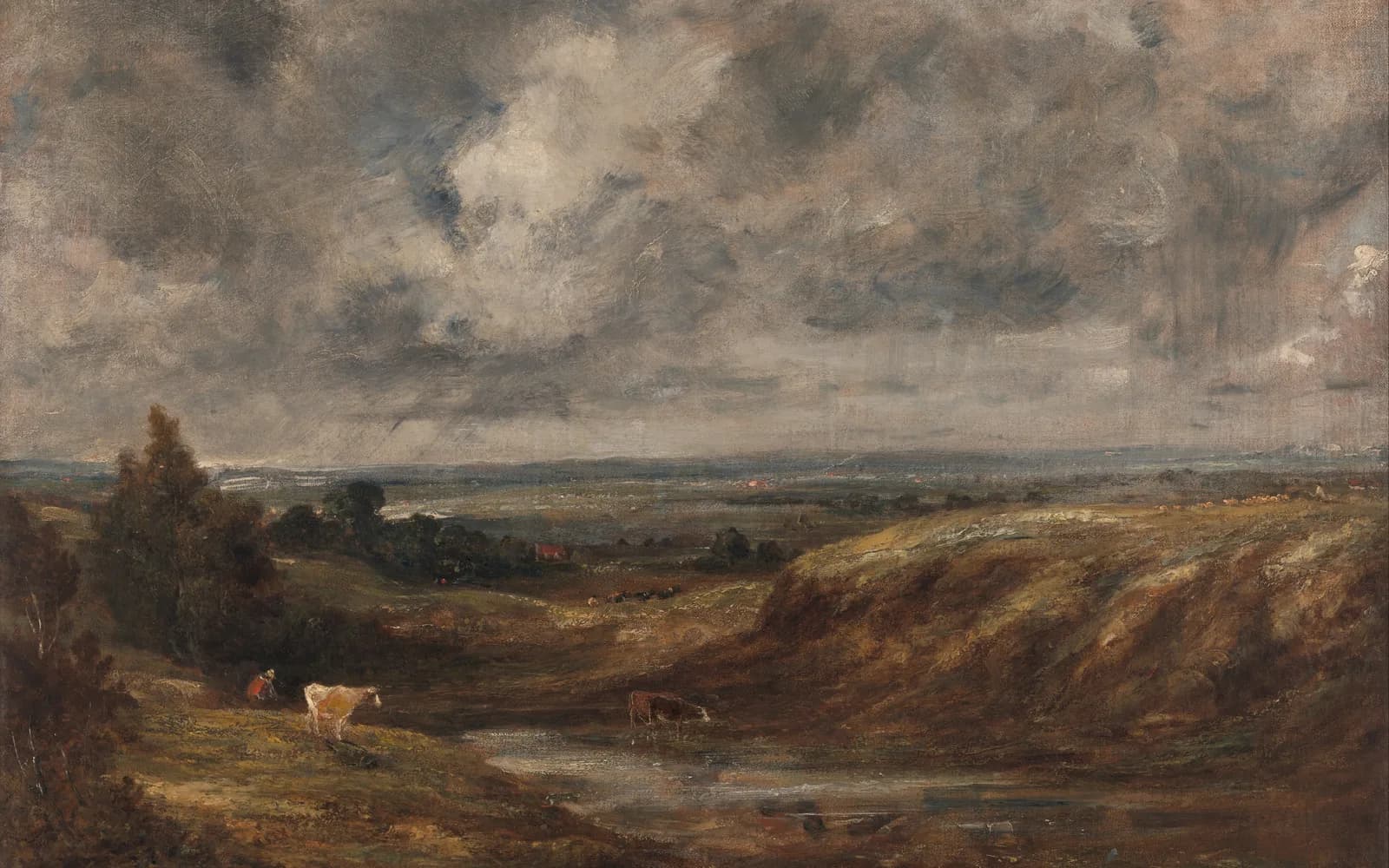 John Constable's wide view of Hampstead Heath under a heavy grey-white cloudbank, with two cows standing by a small pond in a sandy hollow at the left and flat countryside stretching to the horizon